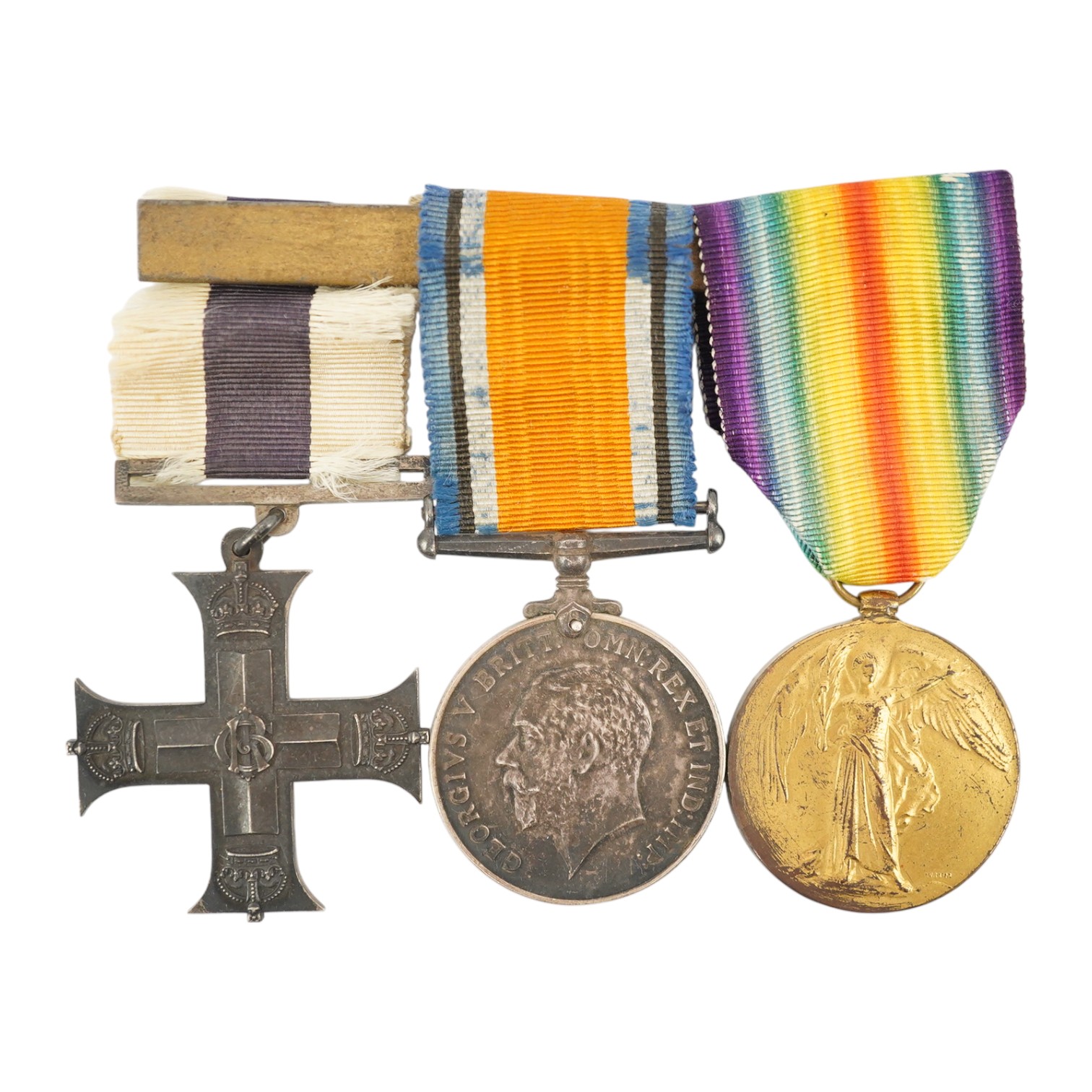 A George V First World War Military Cross (MC) medal group, comprising of a military cross, British war medal, and the victory medal. Condition - poor, the name of the recipient has been removed leaving only ‘W. York R.’